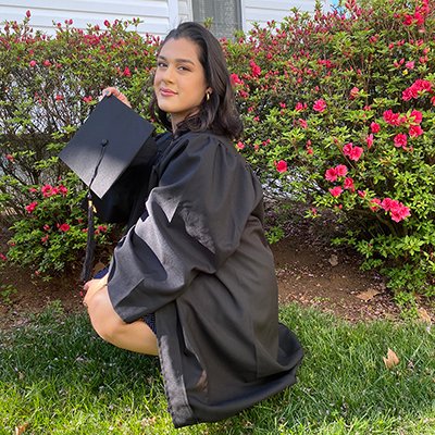 photo of caitlin in a graduation gown