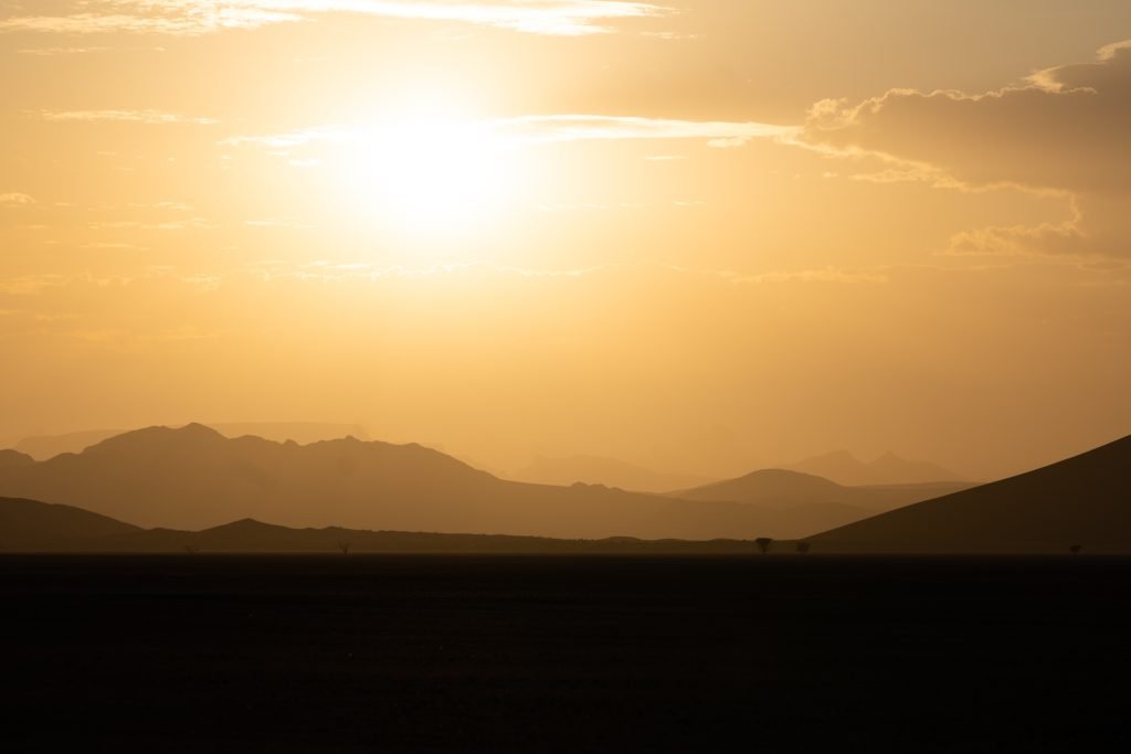 Desert with sun to represent the heat when travelling to hot countries